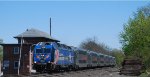 NJT 4502 leads westbound NJT Train 5123 past ex-CNJ BOYD Tower